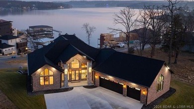 Where LAKE LIVING meets LASTING LUXURY. Sweeping panoramic views - photo 58