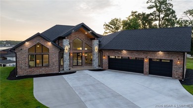 Where LAKE LIVING meets LASTING LUXURY. Sweeping panoramic views - photo 59
