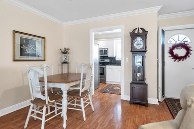 Welcome to this beautifully updated villa, featuring a spacious - photo 11