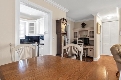 Welcome to this beautifully updated villa, featuring a spacious - photo 13
