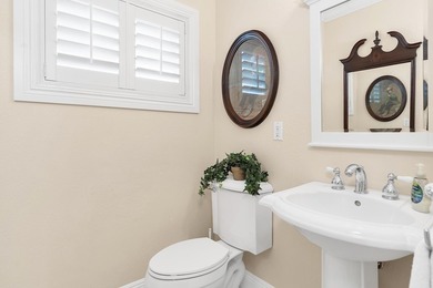 Welcome to this beautifully updated villa, featuring a spacious - photo 21