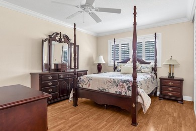 Welcome to this beautifully updated villa, featuring a spacious - photo 22