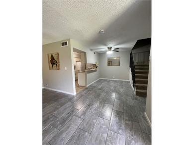 Step into this warm and cozy 2 bed 1.5 bath townhome located in - photo 2