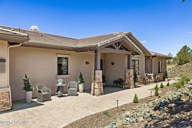 Discover this masterfully upgraded, lightly lived-in gem where