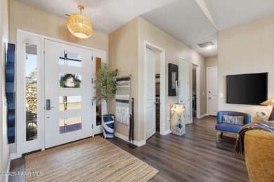 Discover this masterfully upgraded, lightly lived-in gem where