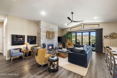 Discover this masterfully upgraded, lightly lived-in gem where