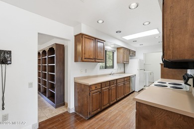 Experience true golf course living in Country Club Estates with