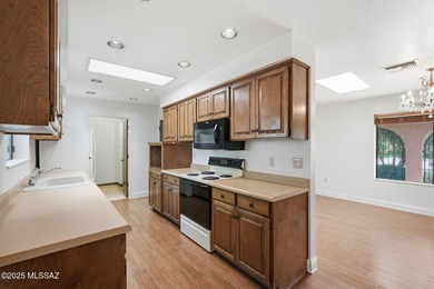 Experience true golf course living in Country Club Estates with