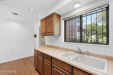 Experience true golf course living in Country Club Estates with