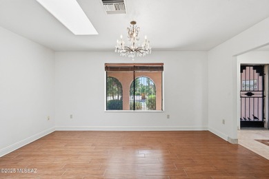 Experience true golf course living in Country Club Estates with