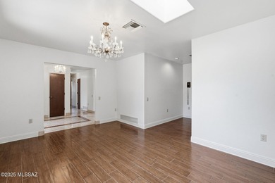 Experience true golf course living in Country Club Estates with