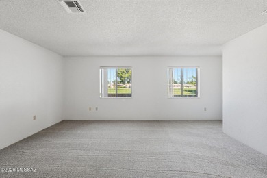 Experience true golf course living in Country Club Estates with