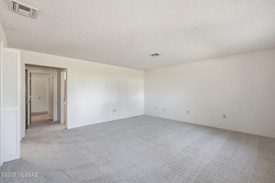 Experience true golf course living in Country Club Estates with