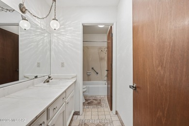 Experience true golf course living in Country Club Estates with