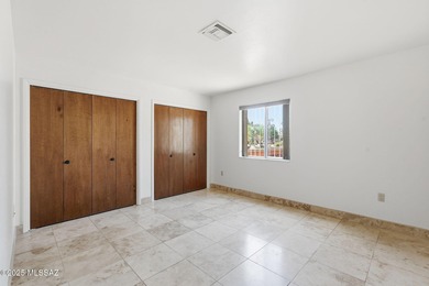 Experience true golf course living in Country Club Estates with