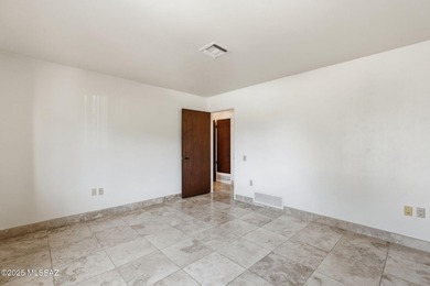 Experience true golf course living in Country Club Estates with