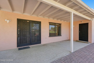 Experience true golf course living in Country Club Estates with