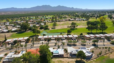 Experience true golf course living in Country Club Estates with