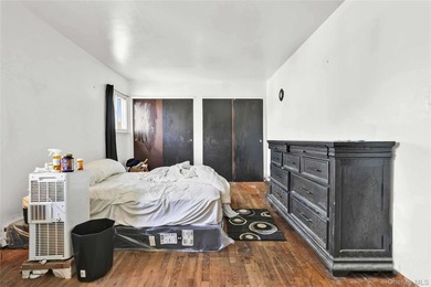Welcome to 115-36 157th Street, a spacious two-family home in - photo 11