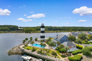 Tucked along a peaceful pond in the Lighthouse Pointe at - photo 40