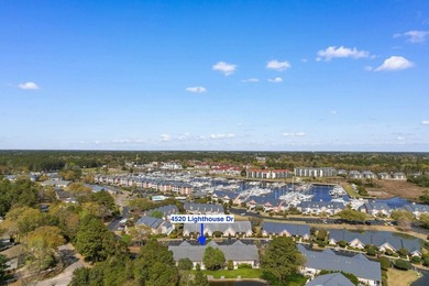 Tucked along a peaceful pond in the Lighthouse Pointe at - photo 46