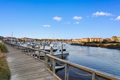 Tucked along a peaceful pond in the Lighthouse Pointe at - photo 49