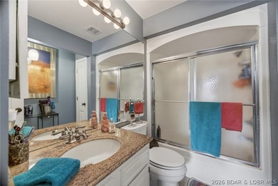 MOTIVATED SELLER! Top-floor views and lake life at its best - photo 12