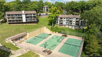 MOTIVATED SELLER! Top-floor views and lake life at its best - photo 26