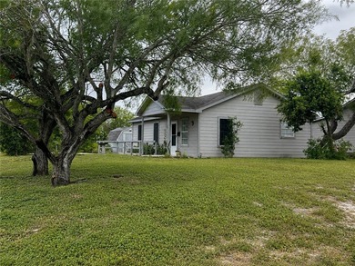Nestled on a spacious corner lot, this charming 3-bedroom - photo 3