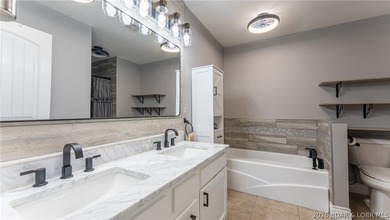 Experience lake living at its best in this beautifully updated - photo 12