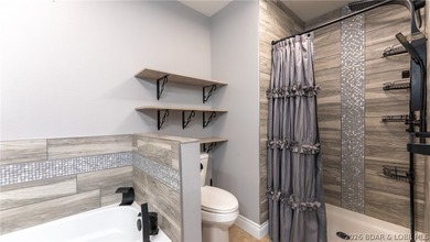 Experience lake living at its best in this beautifully updated - photo 13