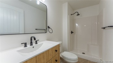 Experience lake living at its best in this beautifully updated - photo 20