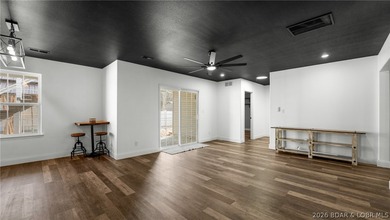 Experience lake living at its best in this beautifully updated - photo 27