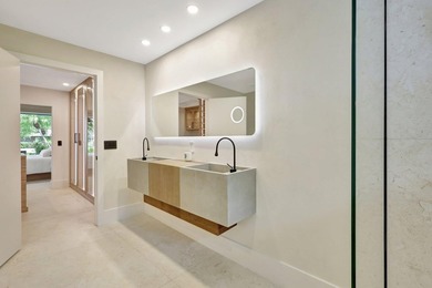 Welcome to an extraordinary residence that seamlessly blends - photo 28