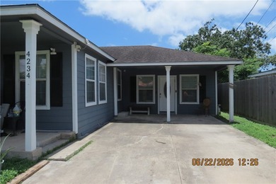 Welcome to a 4-bedroom, 2-bath home featuring a desirable - photo 1