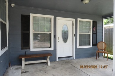 Welcome to a 4-bedroom, 2-bath home featuring a desirable - photo 2