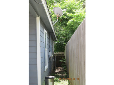 Welcome to a 4-bedroom, 2-bath home featuring a desirable - photo 3