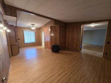 Discover this spacious 3-bedroom, 2-bathroom mobile home located
