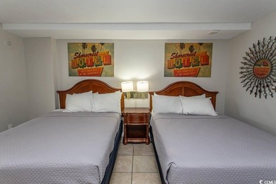 This cozy updated 1-bedroom, 1.5-bath oceanview end unit in