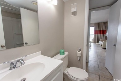 This cozy updated 1-bedroom, 1.5-bath oceanview end unit in