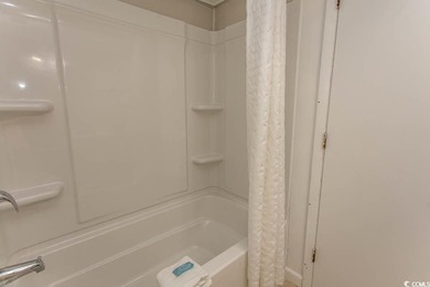 This cozy updated 1-bedroom, 1.5-bath oceanview end unit in