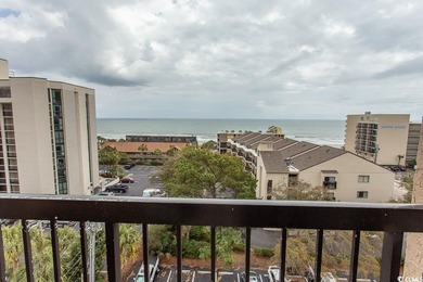 This cozy updated 1-bedroom, 1.5-bath oceanview end unit in