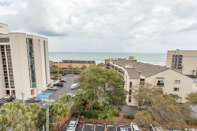 This cozy updated 1-bedroom, 1.5-bath oceanview end unit in