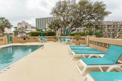 This cozy updated 1-bedroom, 1.5-bath oceanview end unit in