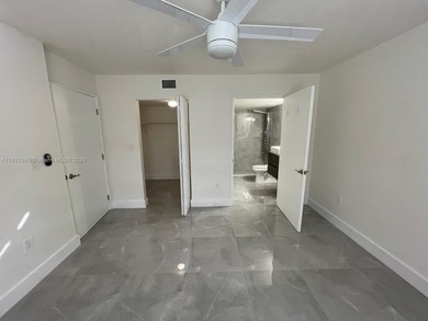 This completely remodeled 3-beds, 2-baths condo offers an