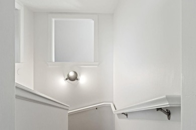 Perched above-it-all in Bayside, this freshly painted penthouse - photo 12