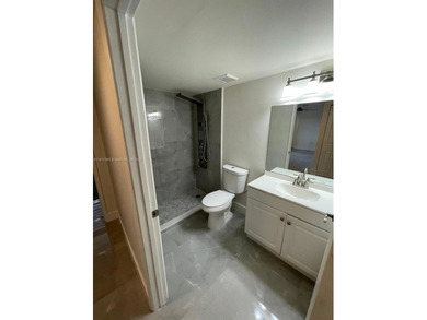 This completely remodeled 3-beds, 2-baths condo offers an