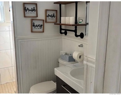 Beautiful Two-Family Duplex Ranch In Seaford Harbor. Mint - photo 15