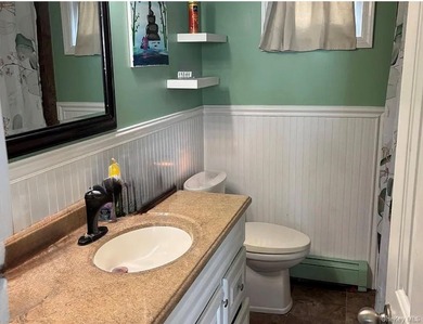 Beautiful Two-Family Duplex Ranch In Seaford Harbor. Mint - photo 16