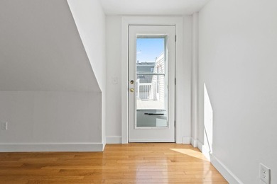 Perched above-it-all in Bayside, this freshly painted penthouse - photo 22